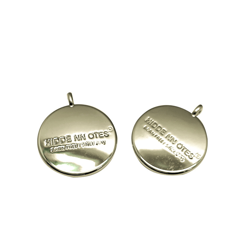 Women's clothing alloy round tags, hand sewn small tags, bags, fashionable hardware accessories, clothing metal tags, logo customization
